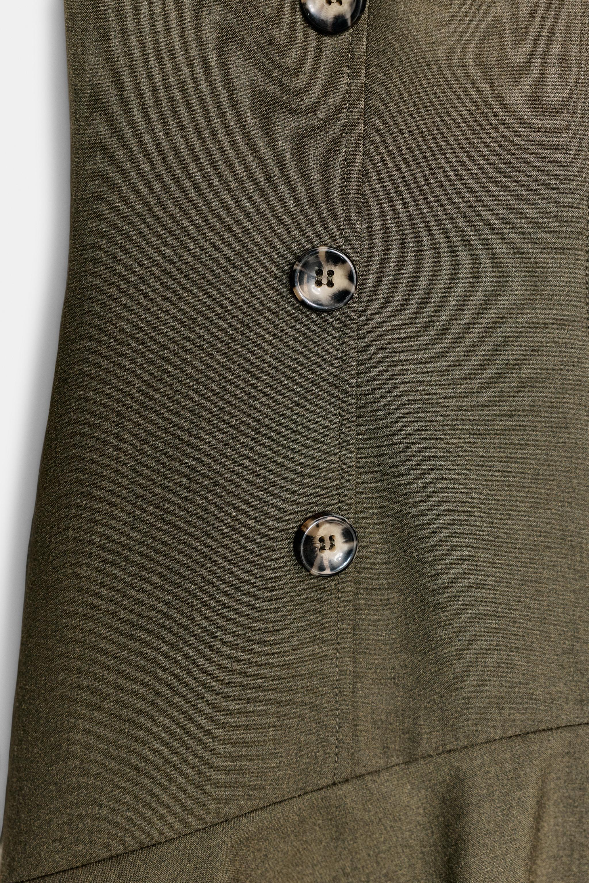 SHORT DRESS WITH SHOULDER PADS AND RUFFLES